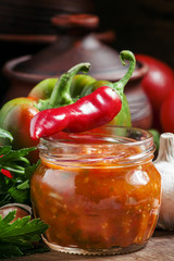 Traditional Georgian sauce with hot pepper - adjika, selective f