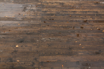 Wet wooden floor texture.