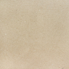 Fototapeta na wymiar Carton beige texture, paperboard sheet as background.