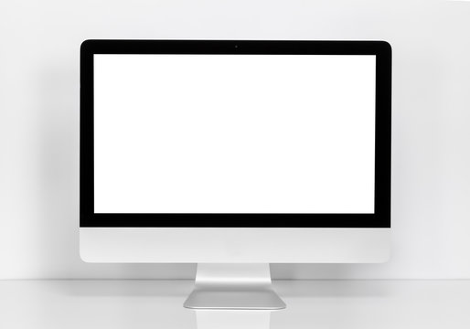 Computer display with blank white screen at the desk