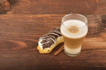 Latte macchiato and eclair