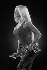 female with dumbbells