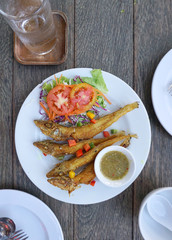 Deep fried fish with turmeric