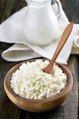 Curd cheese and jug of milk