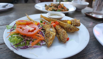 Deep fried fish with turmeric