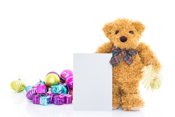 Teddy bear with gifts and blank greeting card