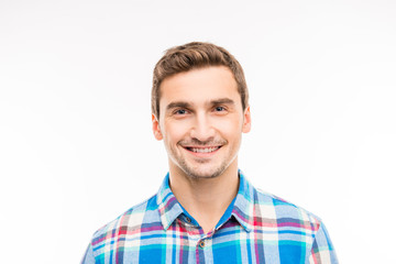 Obraz premium Portrait of a cute cheerful handsome young man