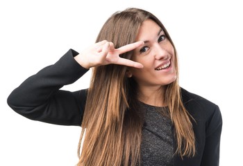 Obraz premium Girl doing victory gesture with her hair on her face