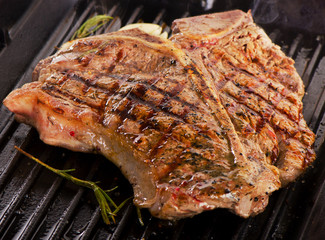 Grilled steak on a grill pan.