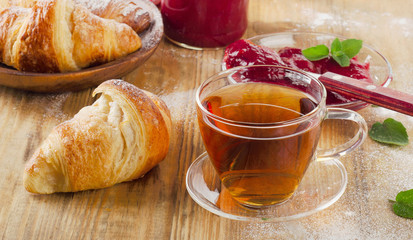 Cup of tea and croissants for  breakfast.