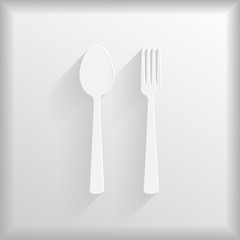 Spoon and fork on a white background