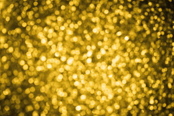 Abstract Holidays Christmas light bokeh background, Gold Color.