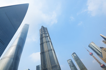 Naklejka premium Skyscrapers of Shanghai. Shanghai World Financial Centre, Shanghai Tower, Jin Mao Tower and Oriental Pearl Tower at Lujiazui. 