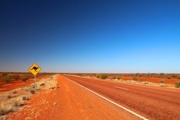 Australian road sign on the highway - obrazy, fototapety, plakaty