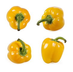 Collection of yellow paprika on white