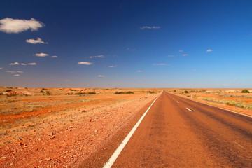 Obraz na płótnie Canvas Australian highway through outback