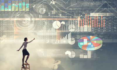 Businesswoman reaching idea