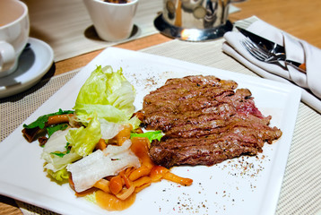 The veal chop on the grill