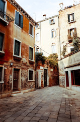 Fototapeta na wymiar Traditional street view of old buildings in Venice