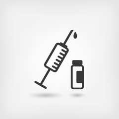 medical symbol. syringe and vial