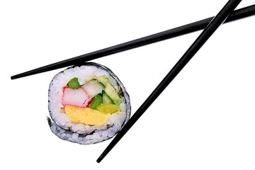 Sushi and chopsticks isolated on white.