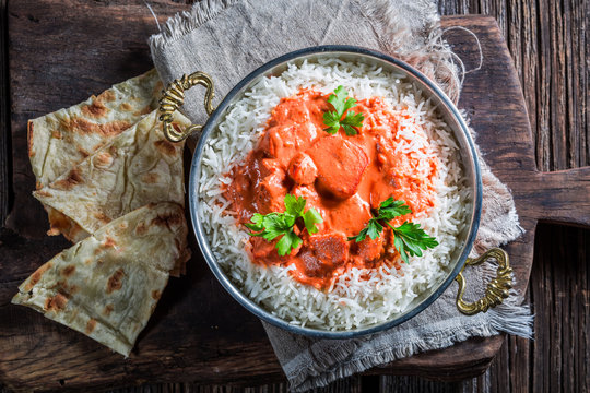 Sweet and spicy tikka masala with rice and sauce