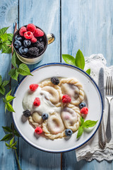 Tasty dumplings with berry fruits