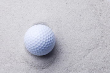 golf ball in sand trap