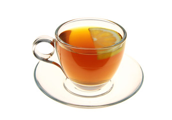 Tea in a glass cup with lemon slice 
