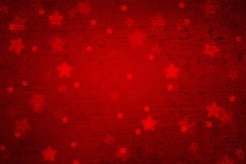 Grunge magical blurry star shape abstract Christmas and New Year Holidays copy space on red background. Lovely red colored textured Xmas greeting card illustration background.