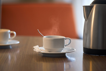 Hot tea on a table in the morning