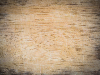 wooden chopping board with scored surface texture