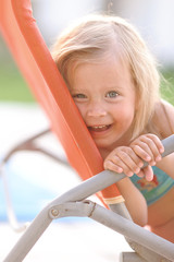 portrait of little girl outdoors in summer