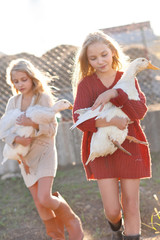 portrait of two sisters during the autumn harvest