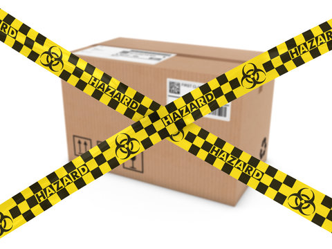 Chemical Mail Attack Concept - Suspicious Parcel Behind Biohazard Tape Cross