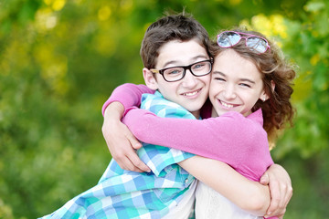 Portrait of a boy and girl in summer