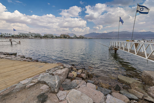 Eilat is a famous resort Israeli city with beautiful beaches, resort hotels and numerous spots of water sport, entertainments and shopping.