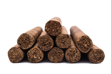 Pile of cigars on white