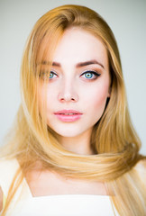 Close up portrait of young blonde woman