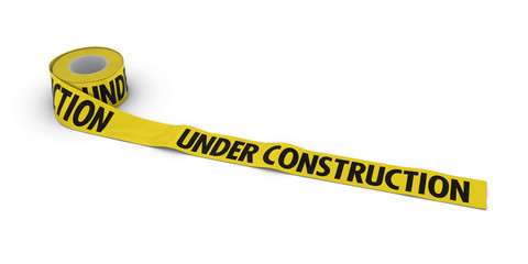 UNDER CONSTRUCTION Tape Roll unrolled across white floor