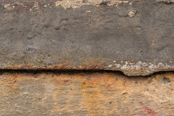 Old metal part with plaster