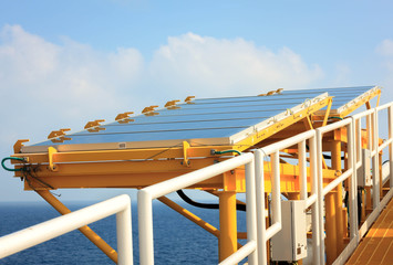 solar cell at offshore platform and sea beautiful blue sky.