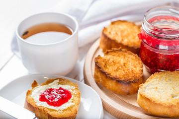 Toasts with butter and jam