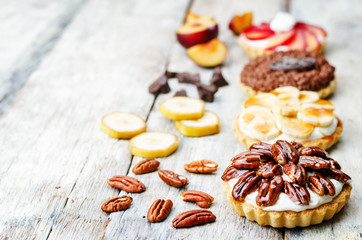 banana salted caramel chocolate plum honey pecan tartlets