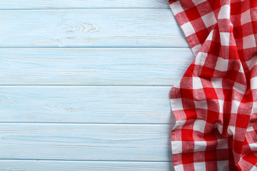 Napkin on blue wooden table, close up