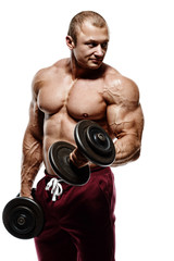 Fototapeta na wymiar bodybuilder in the gym training biceps with dumbbell