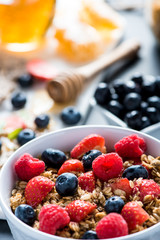 Bowl with fresh berries and cereal