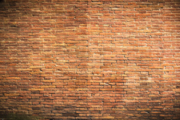 Fantastic brick wall of red clay bricks as a background