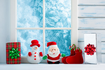 Fototapeta premium Christmas decoration, frozen window scene