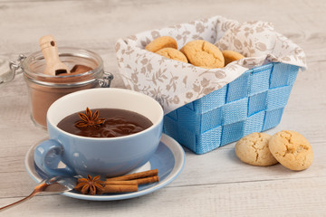 Hot chocolate on rustic background